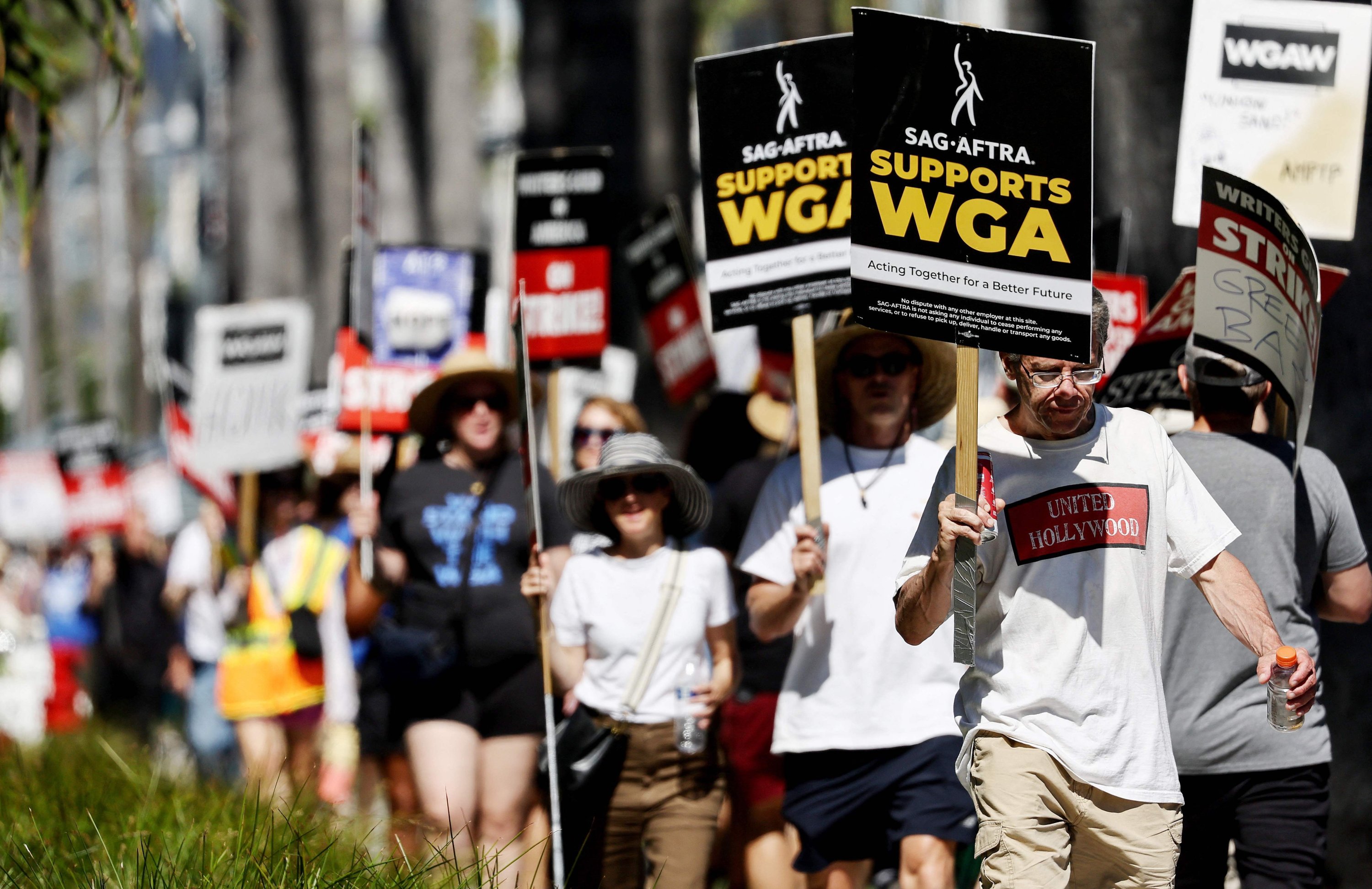 Double Trouble In Hollywood: Writers And Actors Strike Brings Industry To Standstill Double Trouble In Hollywood: Writers And Actors Strike Brings Industry To Standstill