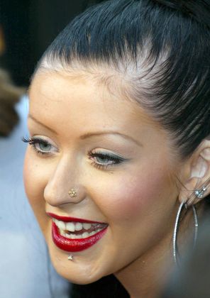 Is This Christina Aguilera? Photoshopped Images Spark Debate Is This Christina Aguilera? Photoshopped Images Spark Debate