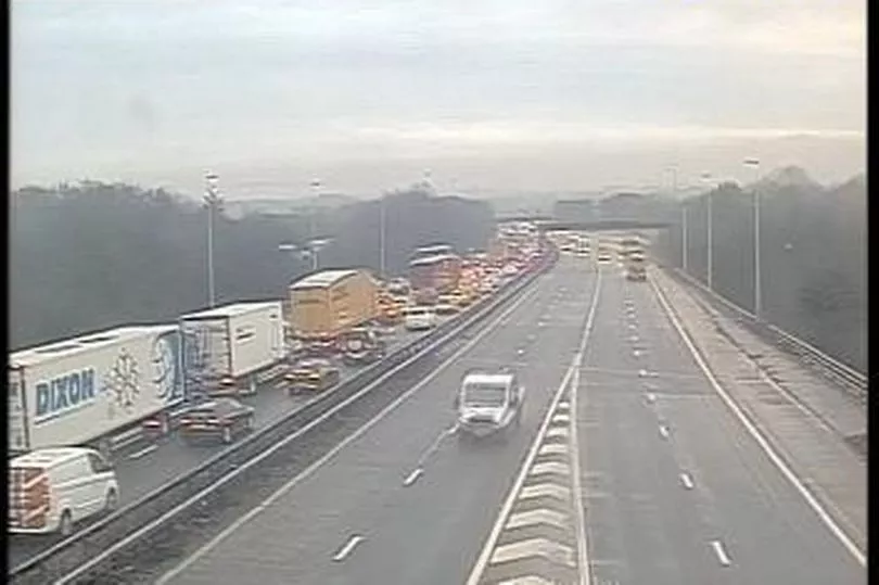 M56 Car Crash: Overturned Vehicle, Casualty Treated On Motorway M56 Car Crash: Overturned Vehicle, Casualty Treated On Motorway