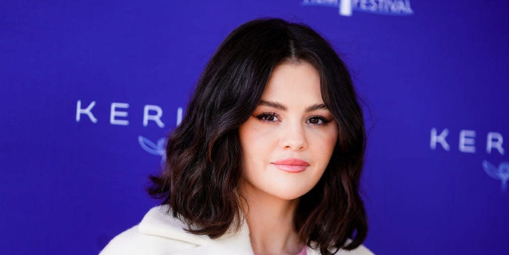 Selena Gomez's Style: The High-Waisted Suit That Defines 80s Office Chic Selena Gomez's Style: The High-Waisted Suit That Defines 80s Office Chic